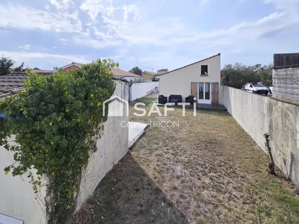 Maison avec jardin et garage - Beau potentiel à Cussac