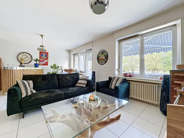 Appartement T3 de 70m2 avec 2 chambres, balcon, cave et garage