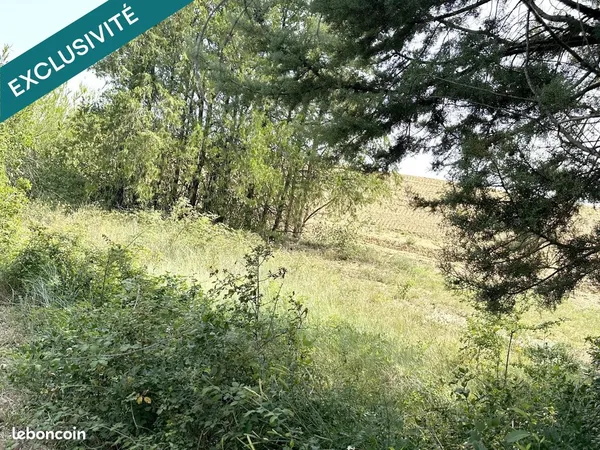 Terrain 1936 m² LAUDUN-L'ARDOISE