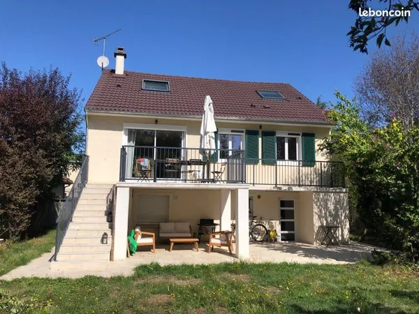 Maison familiale avec rendement locatif au rez de jardin