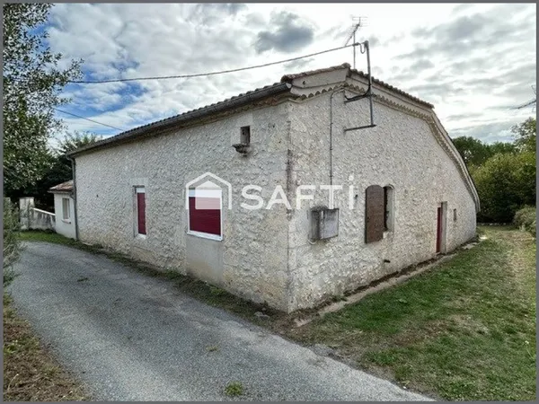 Maison en pierre en coeur de village + dépendances