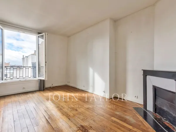 Batignolles- Appartement traversant avec belle vue dégagée