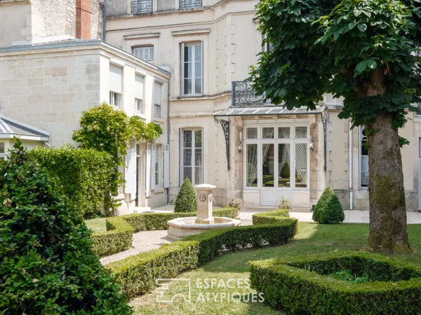 Appartement-maison dans un hôtel particulier du 19ème avec son jardin privatif et son orangerie