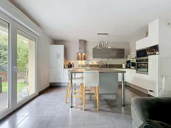 L'HOUMEAU, Appartement à vendre 2 pièces 47m2, rez-de-chaussée avec jardin, parking
