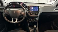 Peugeot 208 1.2 PureTech 82ch E6.c Signature 5p — photo 11