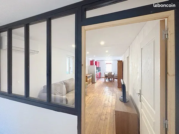 Ensemble immobilier appartement +local commercial celui ci permettant l'habitation