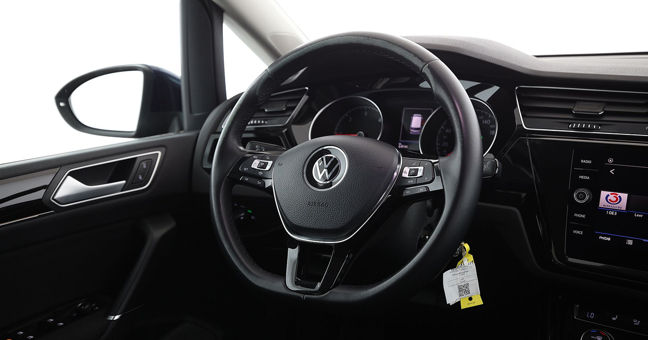 Volkswagen Touran — photo 17