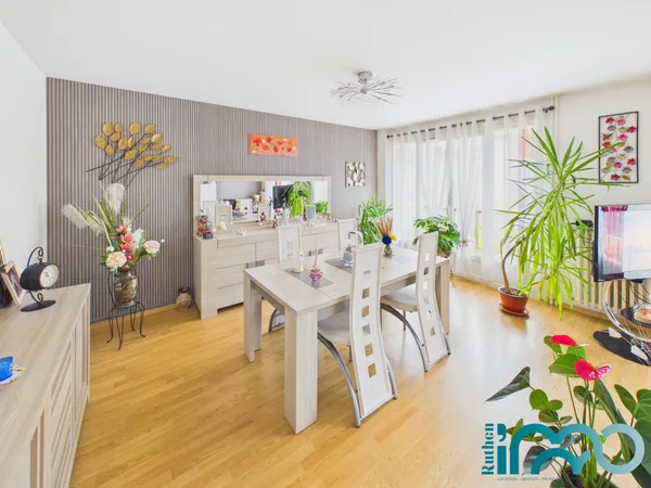 Appartement T3 avec balcon, cave et garage.