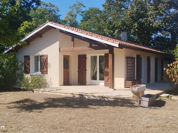 Maison familIale de plain-pied lumineuse 94m² avec grand terrain et garage 33m² - Sanguinet