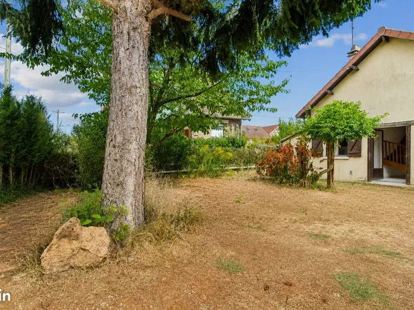 Maison à rénover sur une parcelle de 407 m² arborée - Emplacement rare