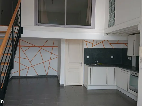 Appartement 30 m² + 15 m² mezzanine avec jardin