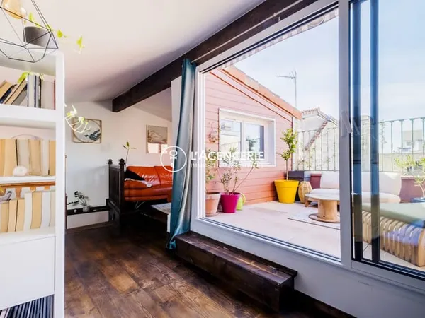 Duplex de 82 m² avec terrasse - rue Saint James