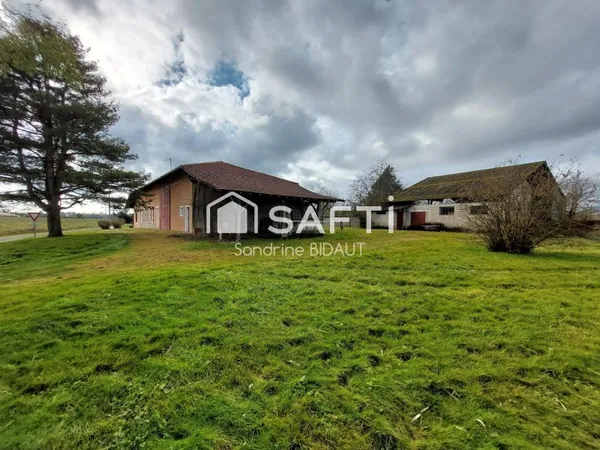 Ferme à rénover 15 763 m² et grandes dépendances