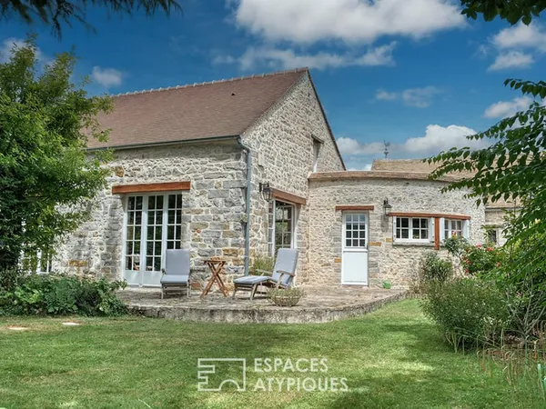 Charmante maison avec grande pièce de vie et belle hauteur sous plafond