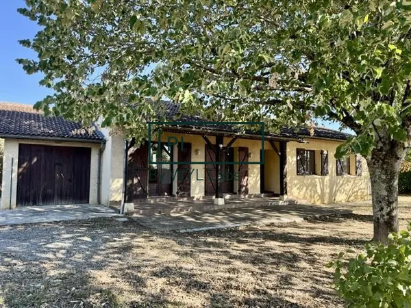 Maison de plain-pied T4 avec garage et jardin arboré