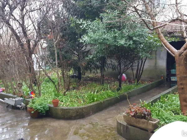 Maison avec jardin et garage
