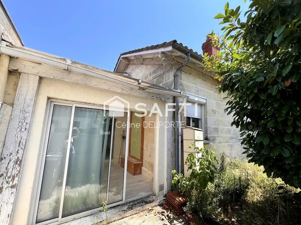 Maison en pierre avec jardin à rénover
