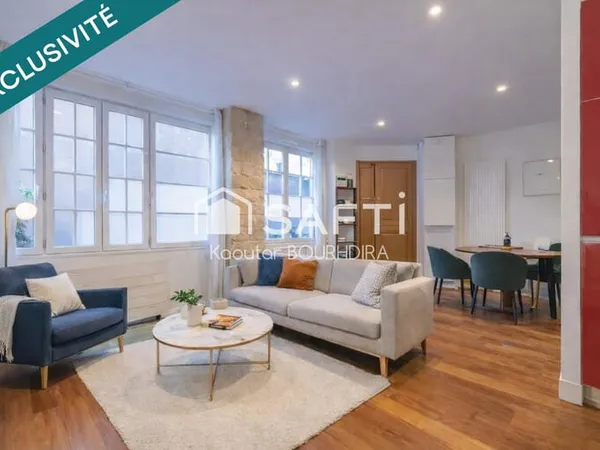 Appartement d'exception en souplex/Local Professionnel  Volumes remarquables  Paris 11€
