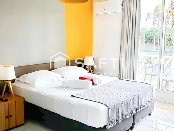 SUPERBE STUDIO EN REZ DE CHAUSSEE AVEC VUE SUR LA PISCINE ET VUE MER ROUTE TOURISTIQUE A SAINT FRANC