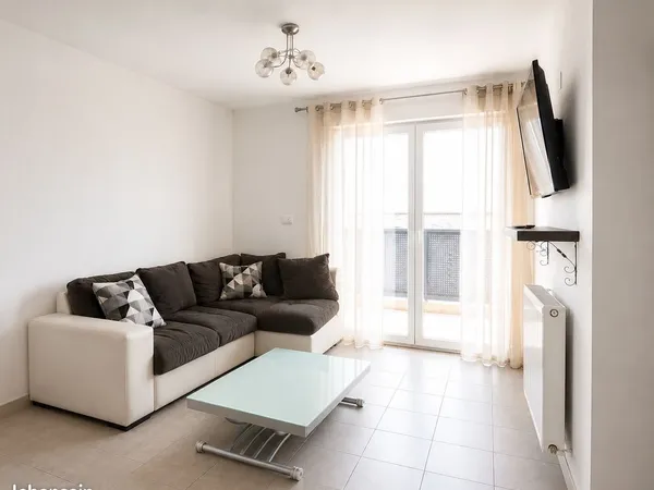 Appartement T3 de 55,10 m² avec balcon, cave et parking - Frontenex (73460)