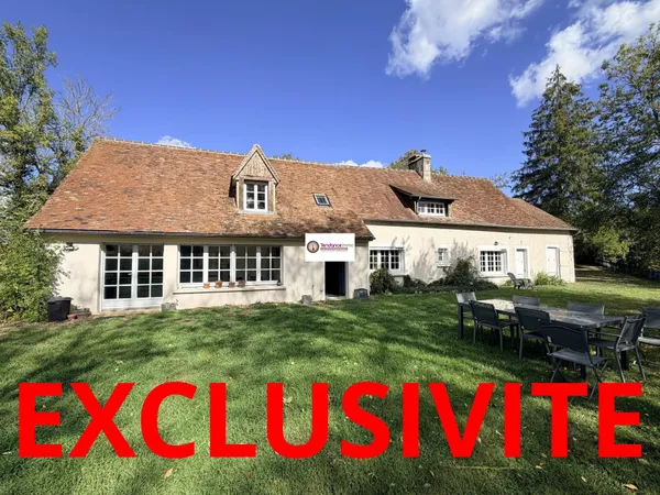 Belle longère familiale avec beaux volumes et jardin arboré