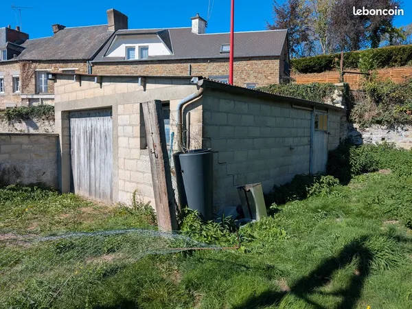 Terrain 486 m² à vendre avec garage 25 m² et puit - Vassy (Valdallière) - Potentiel constructible