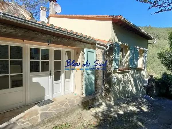 Belle maison de village en pierre avec jardin