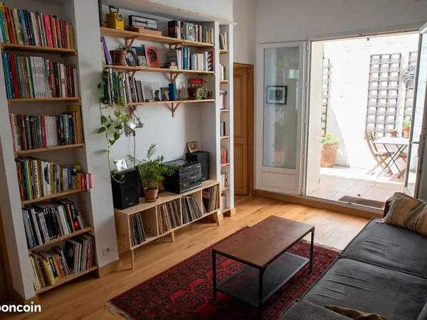 Appartement 2 pièces de 55 m2 avec cour privative