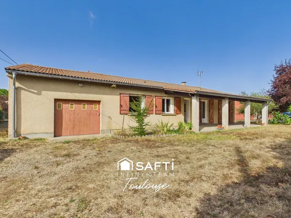 Maison familiale de plain-pied avec 4 chambres, grand garage et jardin