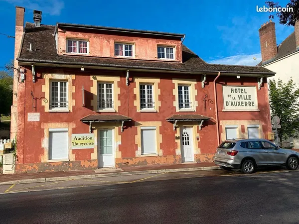 Bâtiment 7 appartements et 1 local commercial