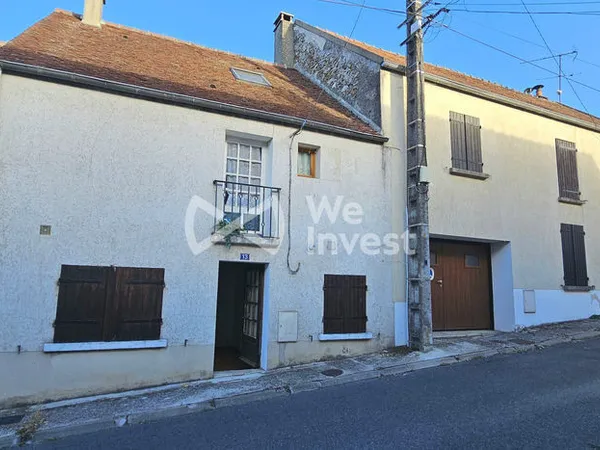 Ensemble immobilier à rénover / 2 maisons / jardin + Garage +