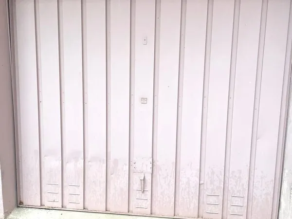 ROMANS CENTRE-VILLE : GARAGE FERME A LOUER