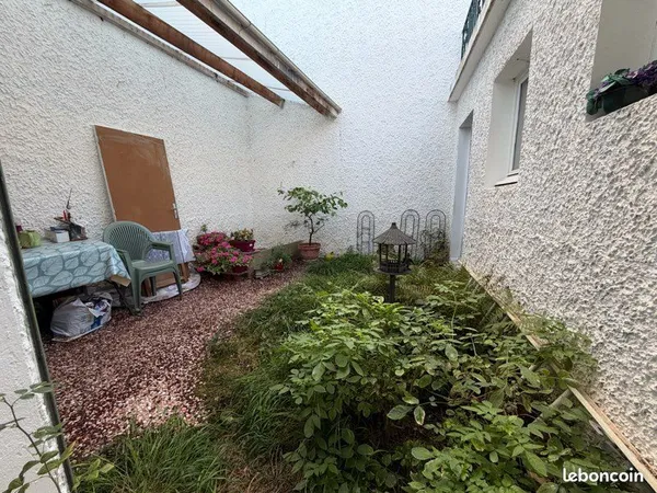Bourgoin maison mitoyenne au calme