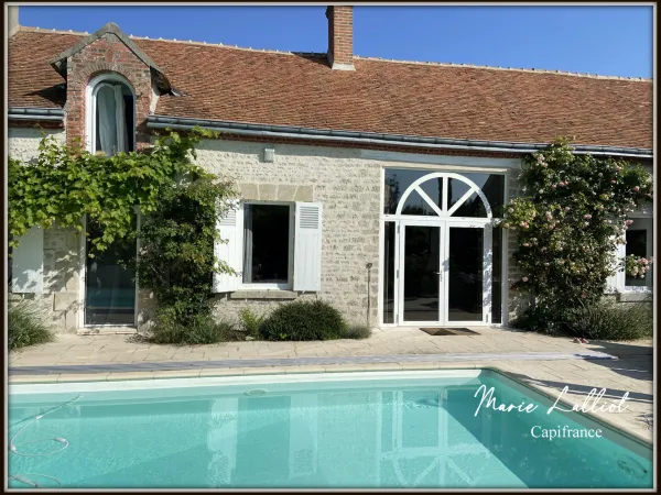Maison 10 pièces 242 m²