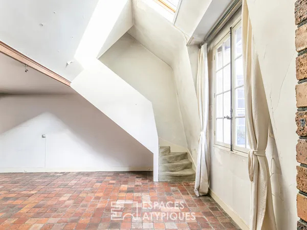 Appartement avec terrasse à réinventer au coeur du marais historique