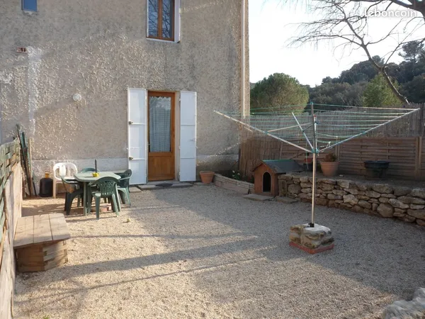 Dans Mas rénové Appartement 100 m2 - 4 Pièces