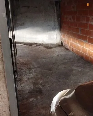 Garage fermé en sous sol 18m2