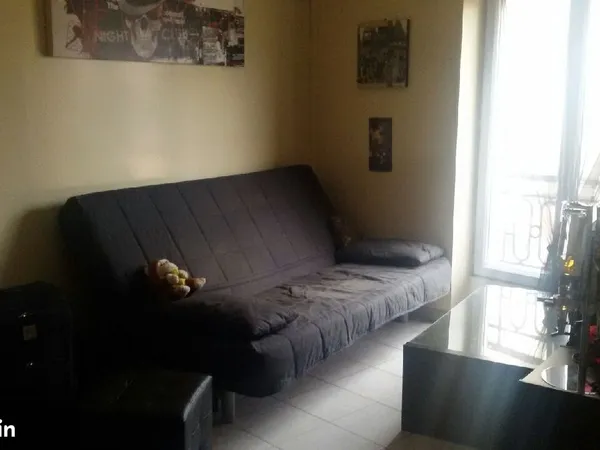 Appartement type F1 dans une petite copropriété avec cour