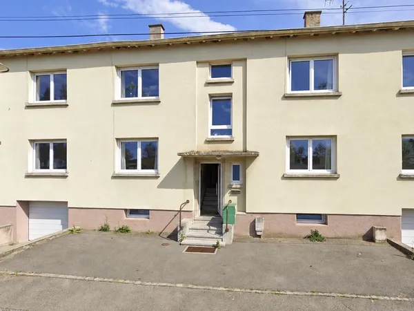 Immeuble 4 appartements et 2 garages - classé énergie D