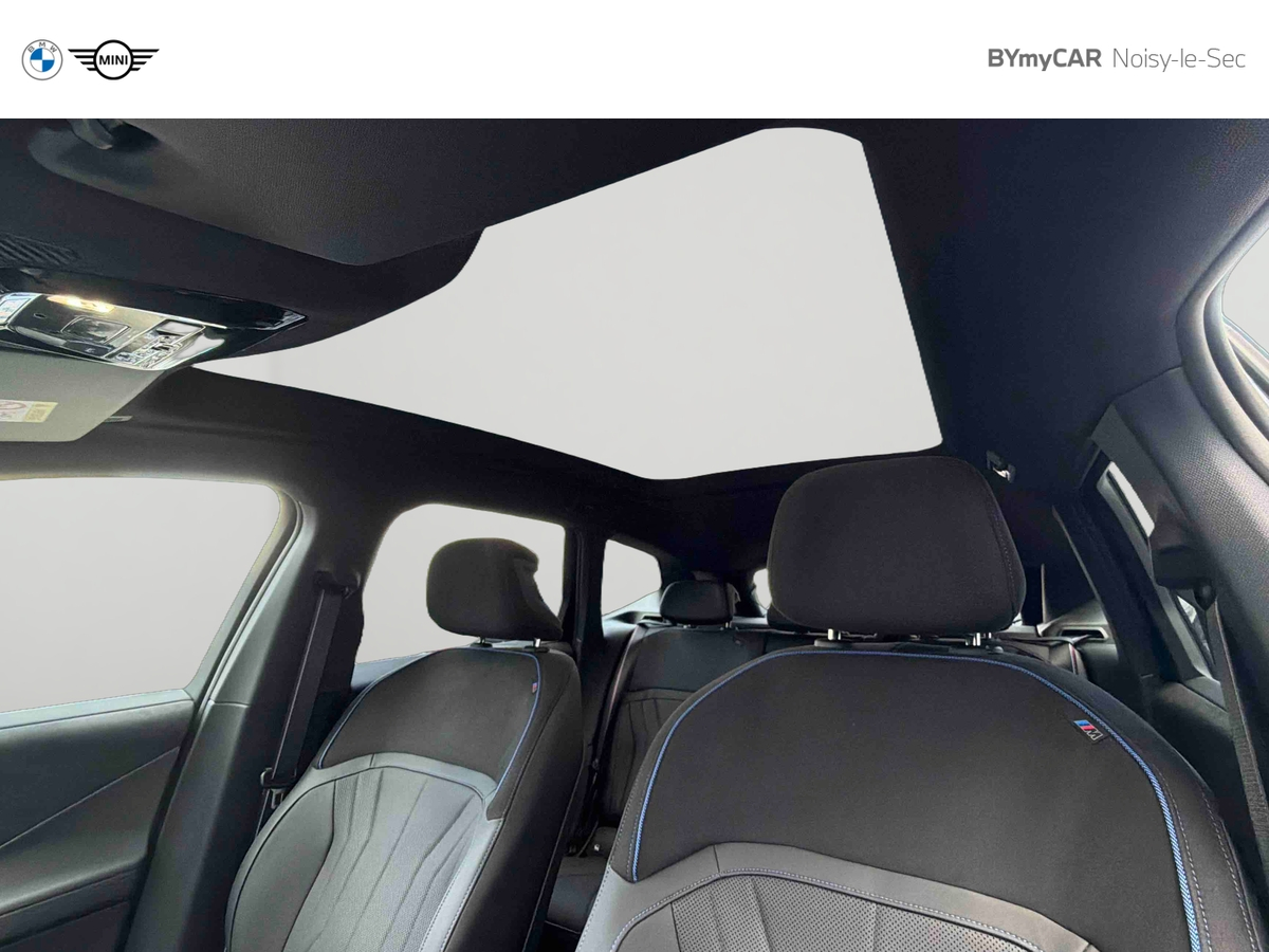 BMW iX3 50 xDrive — photo 23
