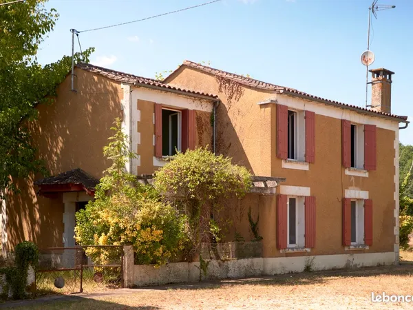 Propriété 2 maisons / terrain