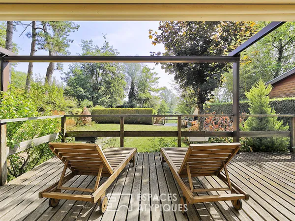 Maison en bois avec jardin et belle vue lac