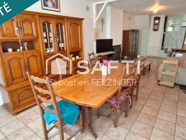 Ensemble immobilier situé dans le village très prisé de Bruyères-et-Montbérault !