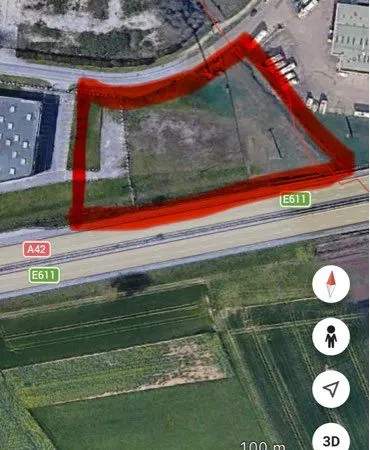 Terrain 6000m2 bordure autoroute avec acces A42 a 500m
