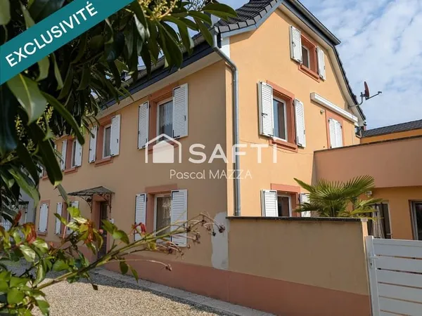 Duplex 112m² avec terrasse et garage, centre ville