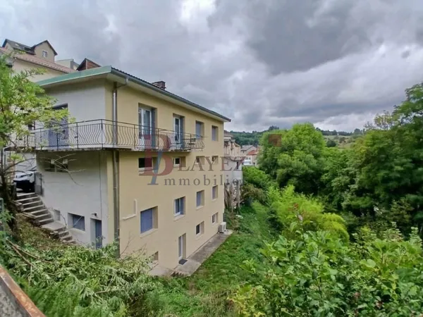 IMMEUBLE DE RAPPORT 3 APPARTEMENTS ET 3 GARAGES - TULLE