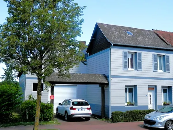 MAISON en Centre Ville avec Garage, Jardin et Dépendances
