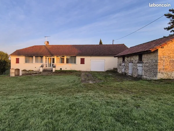 Maison à Louer - 3 chambres avec garage et jardin