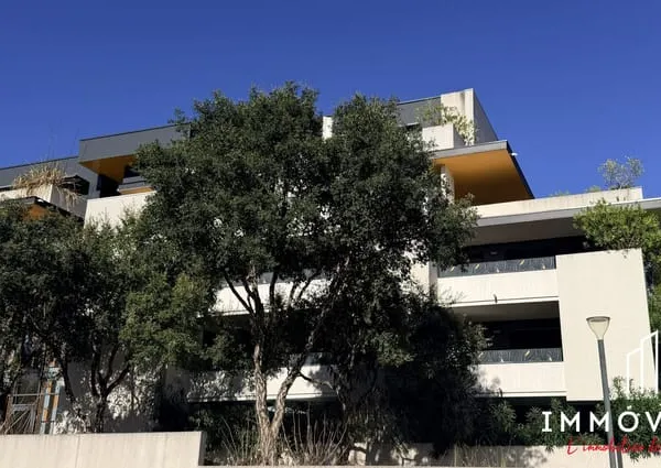 T3 DE 69,80 m² AVEC TERRASSE DE 12 m² ET 2 GARAGES