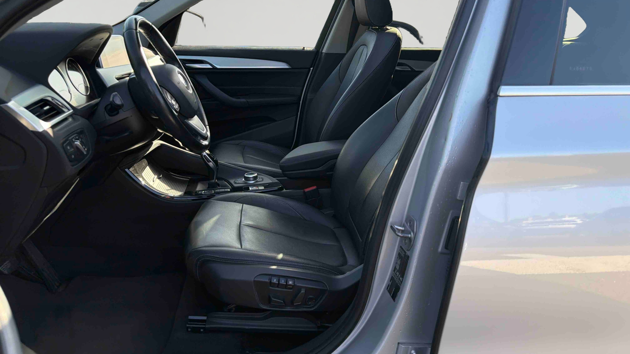 BMW X1 sDrive 18i 140 ch DKG7 — photo 19